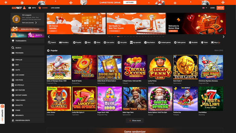 An online casino lobby screen showing a Christmas-themed promotion banner, a left sidebar of game categories, and a grid of game tiles under a Popular tab.