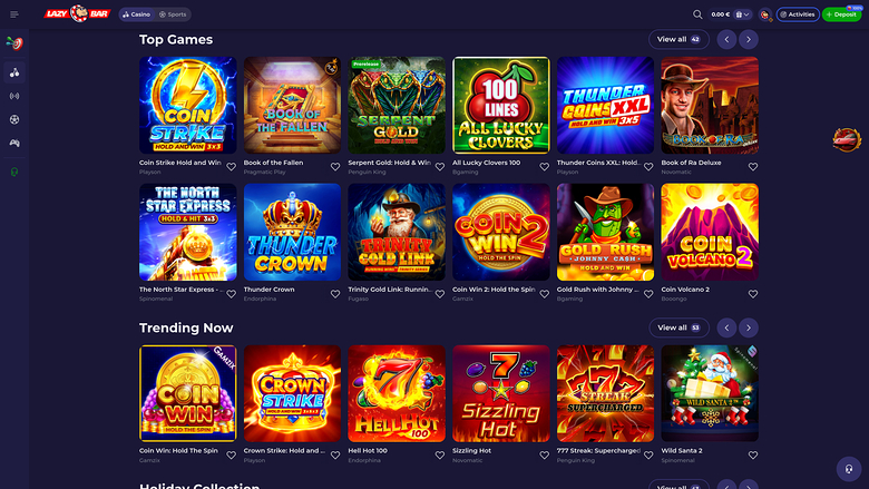 An online casino lobby screen showing rows of game tiles under Top Games, Trending Now and Holiday Collection headings.