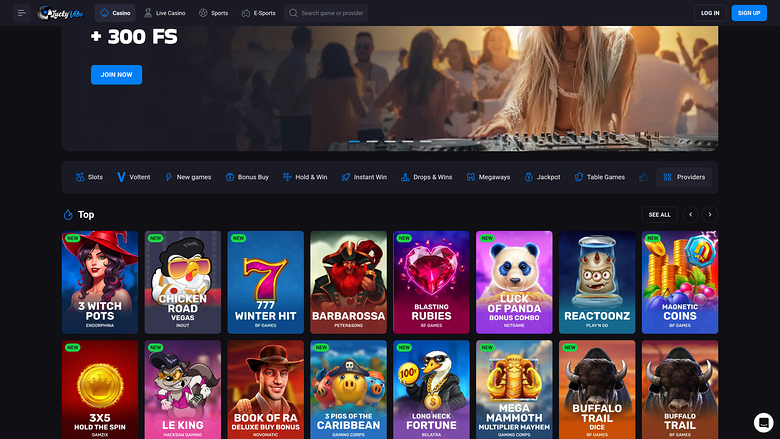 {"summary":"An online casino lobby homepage showing a promotional hero banner and a grid of game tiles under a 'Top' heading.","colours":"Dark navy and black ba