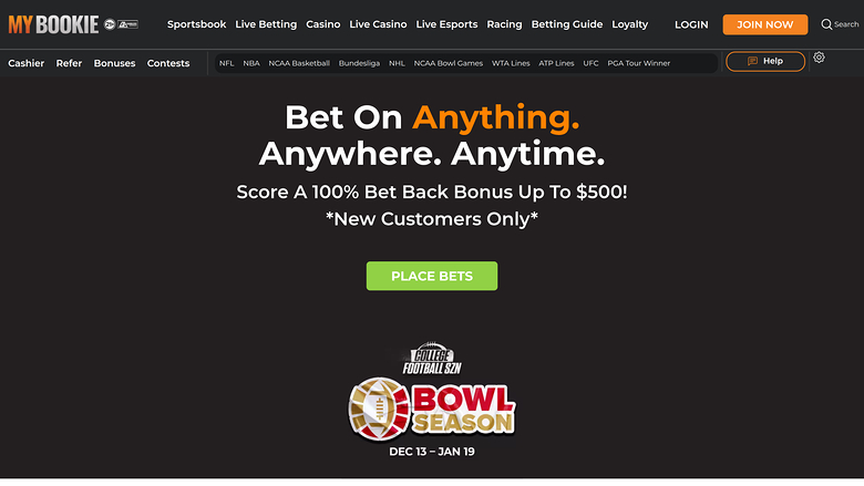 A MyBookie sportsbook homepage hero promoting a 100% bet back bonus up to $500 for new customers with a 'PLACE BETS' button and a college football bowl season g