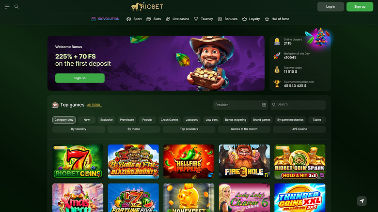 A RioBet online casino lobby page showing a welcome bonus hero banner, a jackpot sidebar and a grid of game tiles.