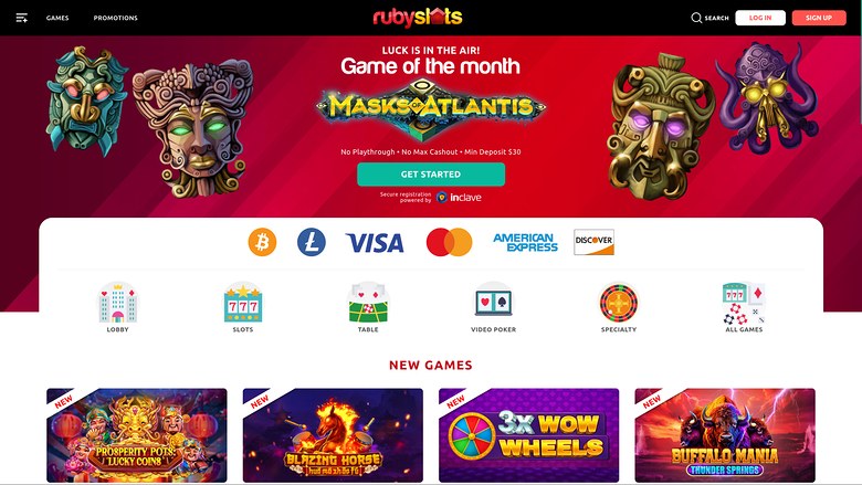 A Ruby Slots casino homepage showing a 'Game of the month' hero for Masks of Atlantis, payment icons, game category icons and a New Games row.