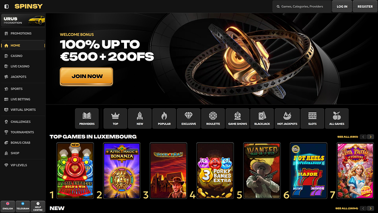 A Spinsy online casino homepage showing a welcome bonus hero banner and a row of top game tiles.